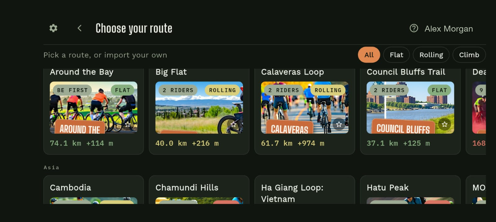 Saval Studio's route picker, showing real routes from around the world to ride indoors, or import your own.